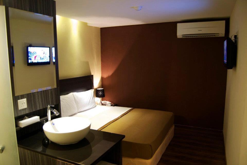 Zotel Business & Leisure Hotel Kuching Værelse billede
